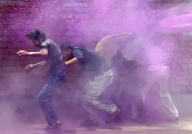 Kashmiri govt employees hit by water cannon during a protest in Srinagar June 10, 2008. (Photo: Reuters)