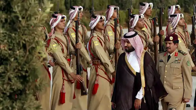 Saudi Arabia’s 30-year-old crown prince and defence minister, Mohammed bin Salman, inspects troops. 