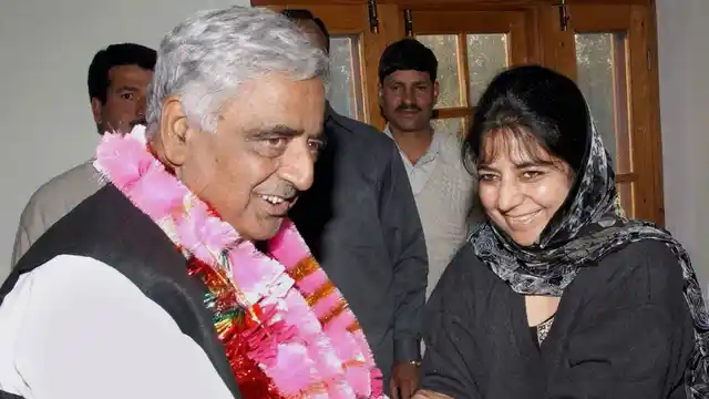 File photo of Mufti Mohammad Sayeed with his daughter Mehbooba Mufti during a meeting in Srinagar in October 2002. (Photo: PTI)