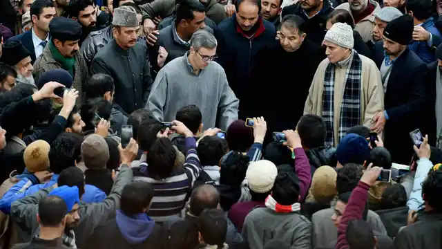Former Chief Ministers of Jammu and Kashmir, Ghulam Nabi Azad and Omar Abdullah offering funeral prayers to Chief Minister of Jammu and Kashmir Mufti Mohammad Sayeed in Srinagar on Thursday. (Photo: PTI)