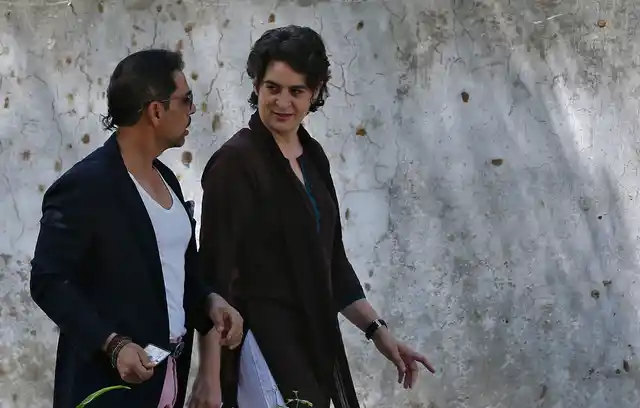 Priyanka Gandhi and husband Robert Vadra leave after casting their vote at a polling station in Delhi, 2014. (Photo: Reuters)