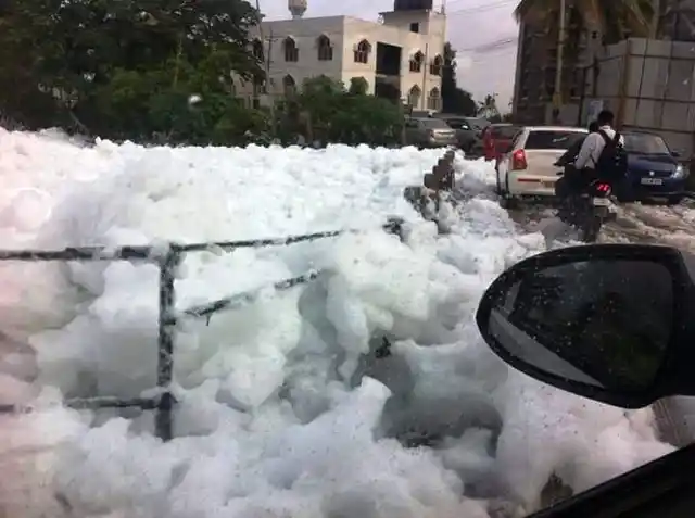 Bellandur Lake spewing froth in Bengaluru. (Photo Courtesy: The News Minute)