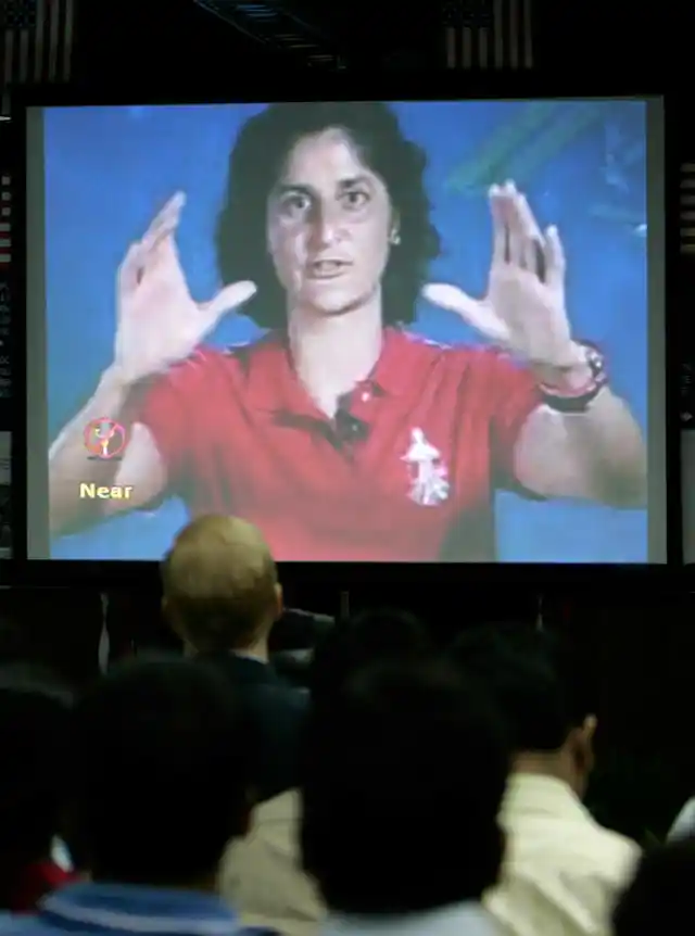 U.S. astronaut Sunita Williams shares her experiences with Indian students, scientists and journalists during a video conference in Kolkata July 20, 2007. Williams had set an endurance record for the longest space flight by a woman during her stint aboard the space station. 