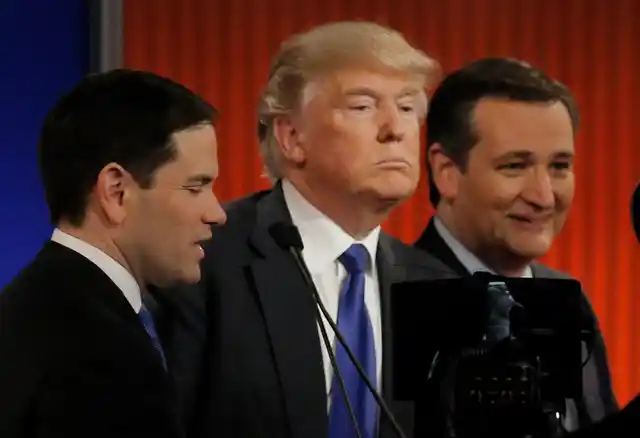 Republican U.S. presidential candidate Donald Trump (C) talks with rival candidates Marco Rubio (L) and Ted Cruz (R) at the conclusion of the U.S. Republican presidential candidates debate in Detroit, Michigan (Photo: Reuters)