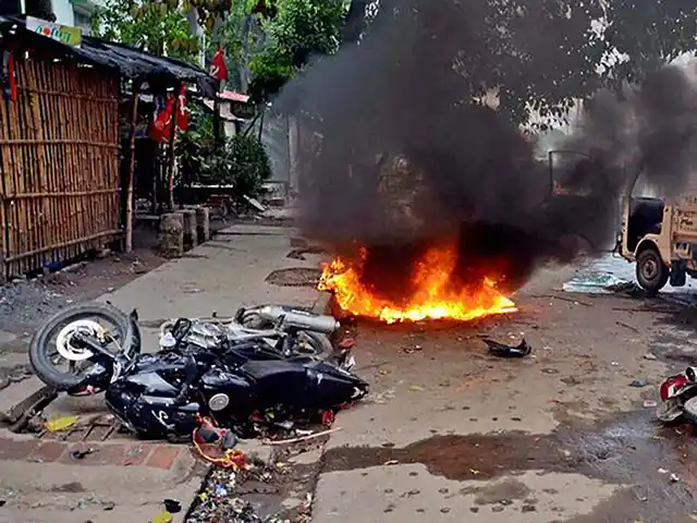 Motorcycles in flames after clashes during municipal
elections in Saltlake. (Photo: PTI) 