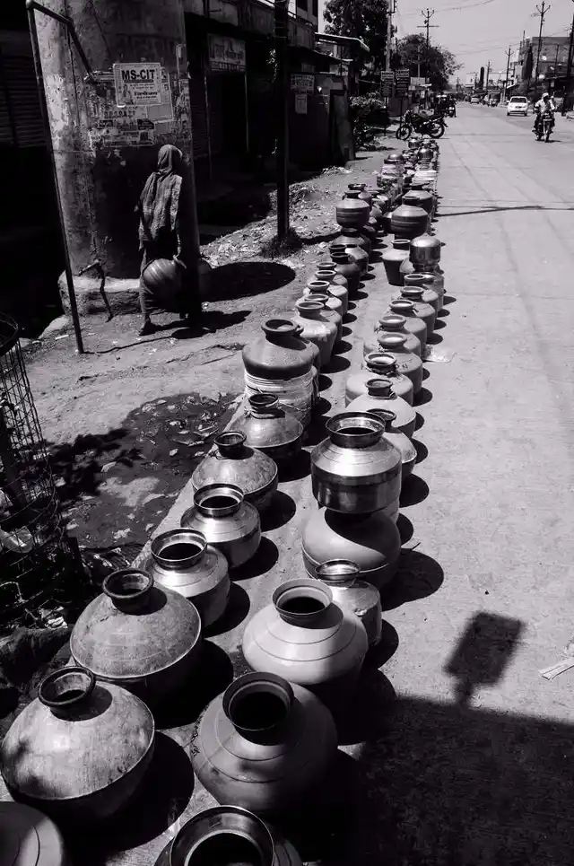 The streets of Latur town are perpetually lined with steel jugs in anticipation of a tanker’s arrival. (Photo: Ameya Marathe, curated by Nikhil Inamdar)