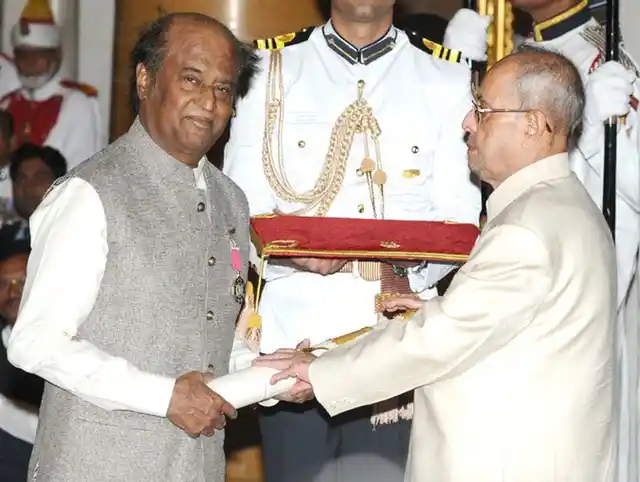 President Pranab Mukherjee confers the Padma Vibhushan on veteran actor Rajinikanth at the Rashtrapati Bhavan. (Photo: PIB)