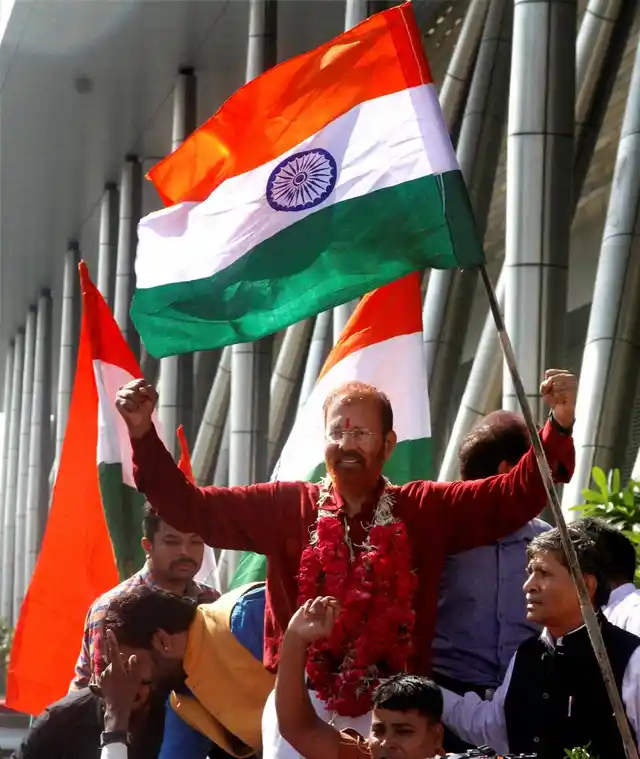 Former Gujarat police officer DG Vanzara with wife Gauriben at Sardar Patel International Airport in Ahmedabad on Friday, 8 April 2016. (Photo: PTI)