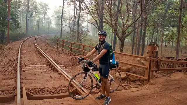 The road from Barbil to Rourkela has been reddened by trucks which ply non-stop, carrying iron ore from the belly of these hills, giving the route an apocalyptic feel.(Photo Courtesy: Ankush Vengurlekar)