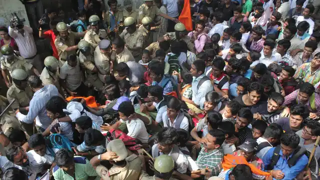 Students protest in front of Department of Pre-University Education (DPUE) following reports that the chemistry question paper got circulated in two-three districts on Whatsapp; in Bengaluru, on March 31, 2016. (Photo: IANS) (Photo: IANS)