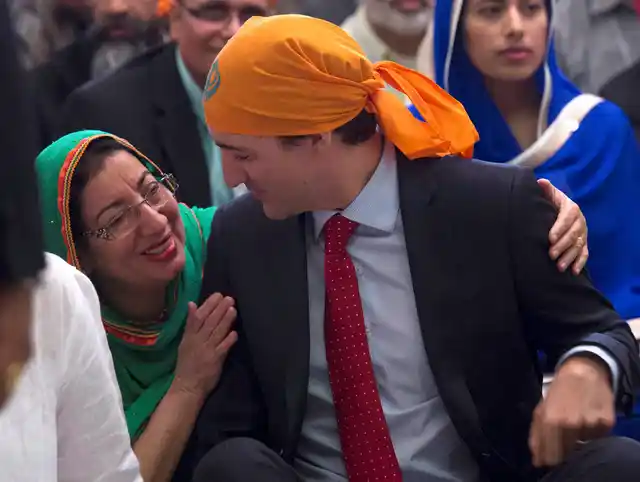 Justin Trudeau shares a moment during Baisakhi celebrations at Gurdwara Sahib Ottawa Sikh Society. (Photo: PTI)