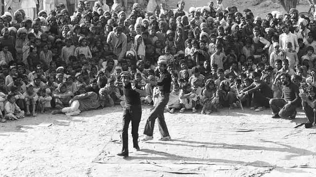 Safdar Hashmi performing with other JANAM members. 