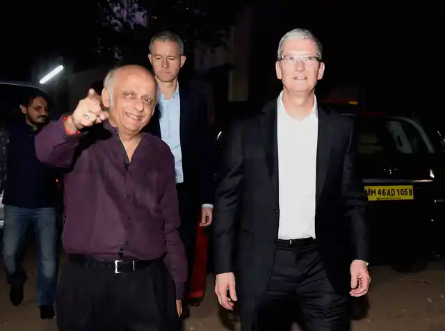 Filmmaker Mukesh Bhatt takes Apple CEO, Tim Cook on a tour of Mehboob studio in Mumbai on Wednesday. (Photo: PTI)