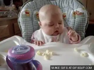 (GIF Courtesy: <a href="http://stream1.gifsoup.com/view/962833/baby-eating-popcorn-o.gif">gifsoup.com</a>)