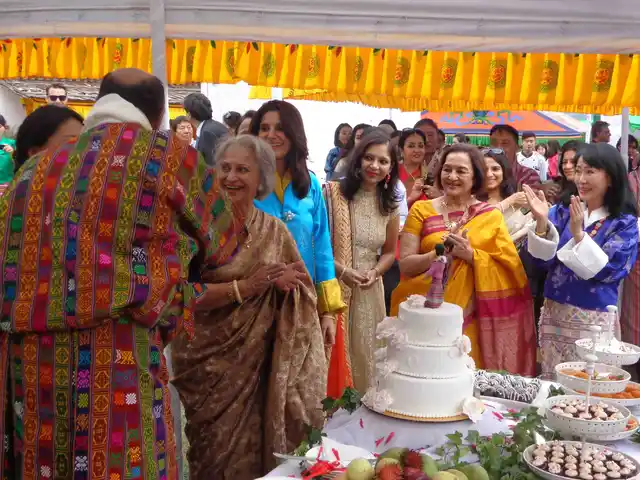 The bridal party around the wedding cake (Photo courtesy: Bhawana Somaaya)