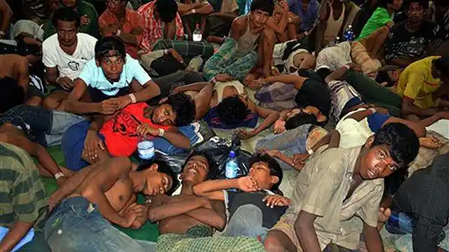 Illegal immigrants from Bangladesh at a processing centre. (Photo: AP)
