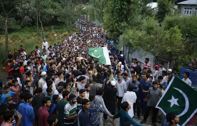People attend funeral procession of militant Burhan Wani at his village in Tral of Jammu and Kashmir`s Pulwama district on 9 July 2016. (Photo: IANS)