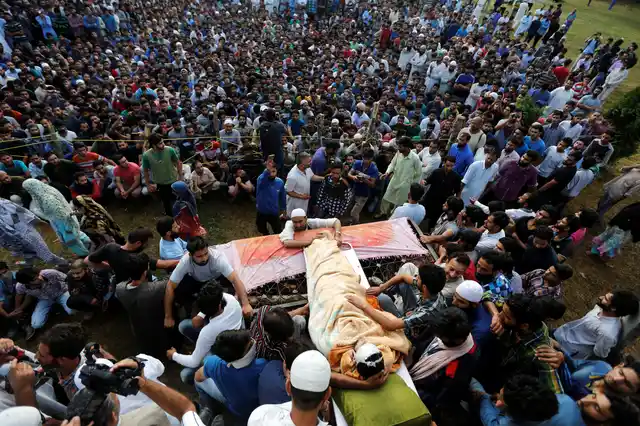 Defying curfew restrictions, the people of Kashmir mourned Burhan Wani’s passing.. (Photo: Reuters)
