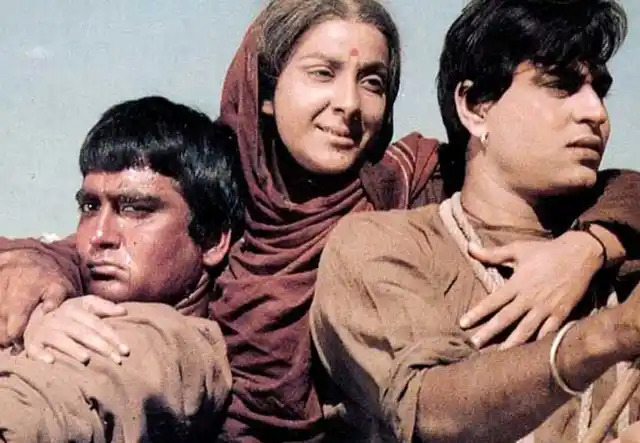 Rajendra Kumar with Sunil Dutt and Nargis in <i>Mother India.</i>