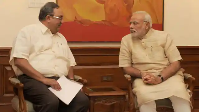 File photo of Gujarat minister Saurabh Patel and Prime Minister Narendra Modi.