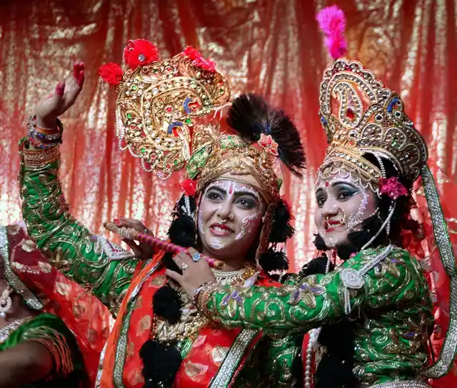People dressed as Lord Krishna and Radha during Janmashtami celebrations. (Photo: PTI)