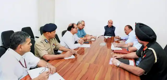 Home Minister Rajnath Singh holding a high-level security meeting at his residence in New Delhi on Sunday in the wake of terror attack at 12th brigade headquarters in Uri. (Photo: PTI)