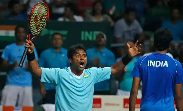 India’s Leander Paes, left, celebrates a point with teammate Saketh Myneni. (Photo: AP)