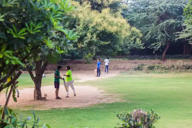 There were at least three groups of people playing cricket that evening. (Photo: Abhilash Mallick/<b>The Quint)</b>