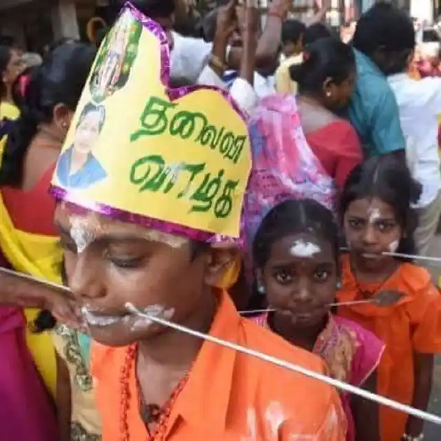 Children with pierced mouths in a prayer rally for Amma’s health. (Photo Courtesy: The News Minute)