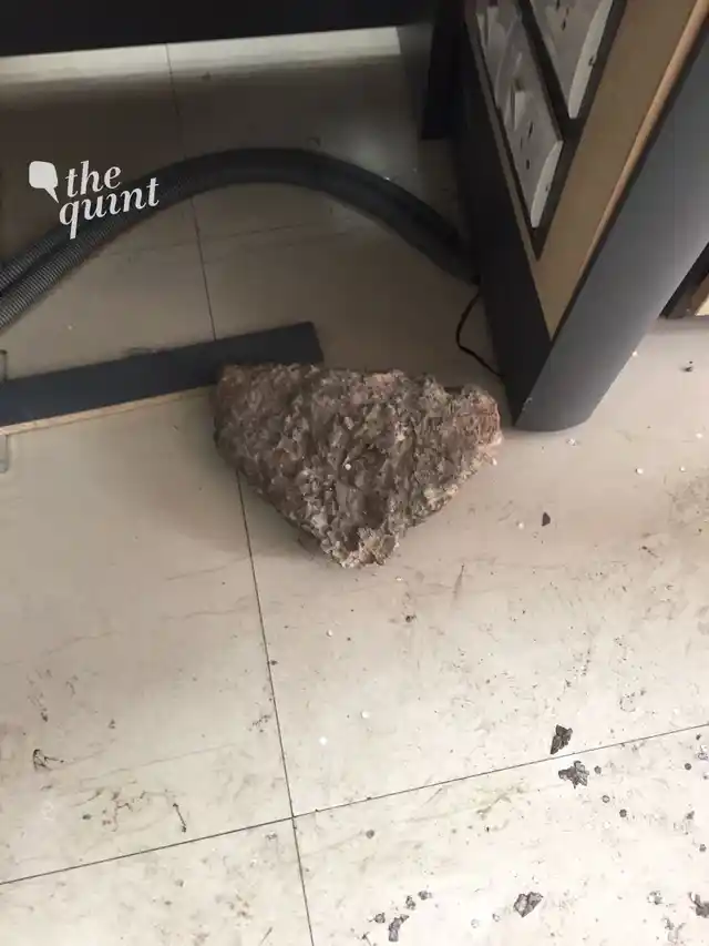 The goons used large stones to attack the bank. (Photo Courtesy: Daljit Kaur)