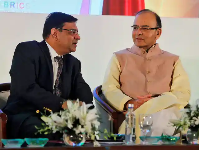 The Reserve Bank of India
(RBI) Governor Urjit Patel speaks with Finance Minister Arun Jaitley
(R) at a seminar in Mumbai, India, 13 October 2016. Patel has not spoken publicly about demonetisation yet. (Picture: Reuters)