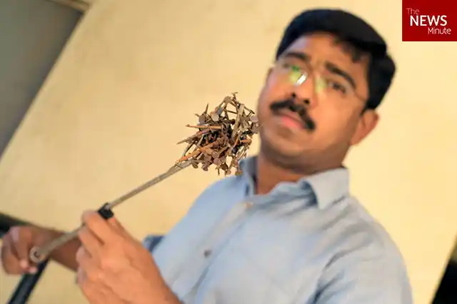 Bengaluru-based Benedict Jebakumar has been combing the road between his home and his office for the past four years. (Photo Courtesy: <a href="http://www.thenewsminute.com/article/how-one-man-collected-70kg-nails-roads-save-your-tyres-puncture-mafia-54823">The News Minute</a>)