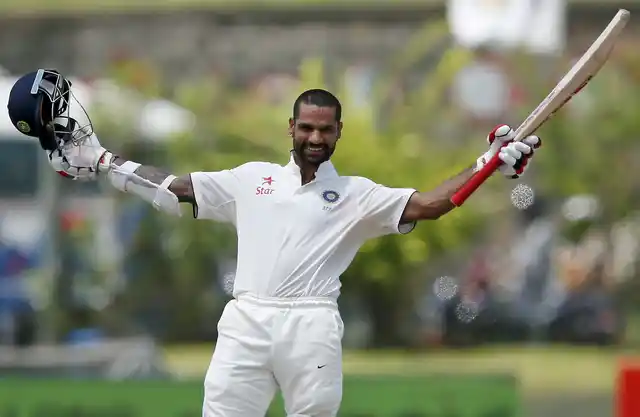The signature Shikhar Dhawan celebration. (Photo: Reuters)