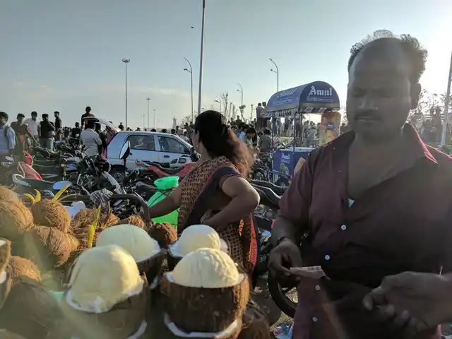Krishnan, at the Chennai Marina Beach, handling brusque business. (Photo: Vikram Venkateswaran)