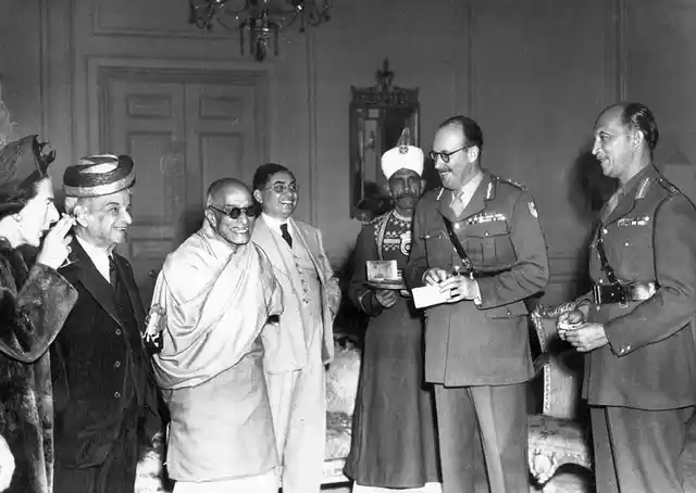 General Sir Roy Bucher (the outgoing Commander-in-Chief) and Lady Bucher at Government House, New Delhi, when they lunched with his Excellency, Shri C Rajagopalachari, and the new Commander-in-Chief, General KM Cariappa.