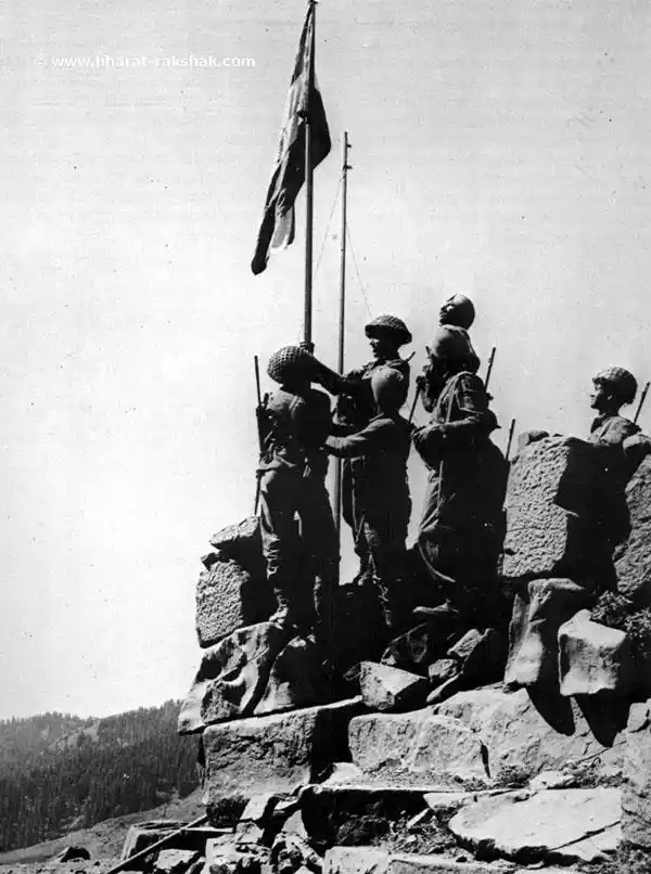 Here the Indian troops raise the Indian tricolour atop Hajipir Pass on 28 August 1965.