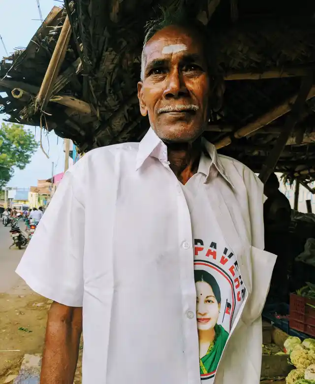 Kariyappa, at the Alanganallur market, about a hundred feet away from the protest. (Photo: Vikram Venkateswaran)