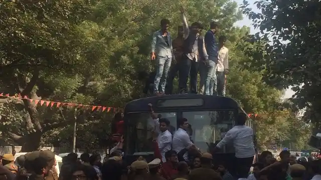 The police’s actions were so ineffective that the ABVP members got on top of police buses and abused protesters. (Photo: Revathi Krishnan)