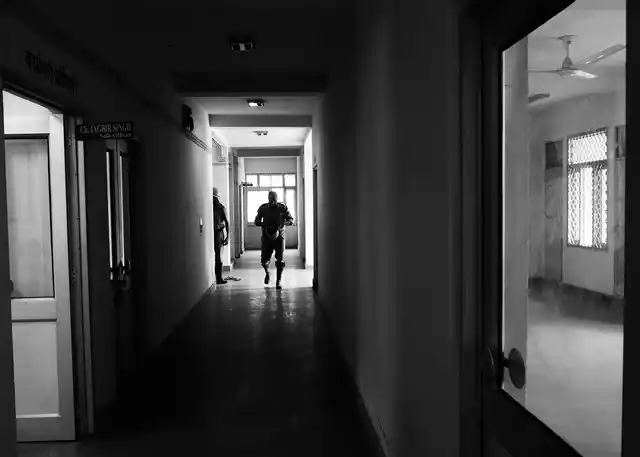 A fireman getting ready while running towards his firetruck right after the call. (Photo courtesy: Sameer Khan)