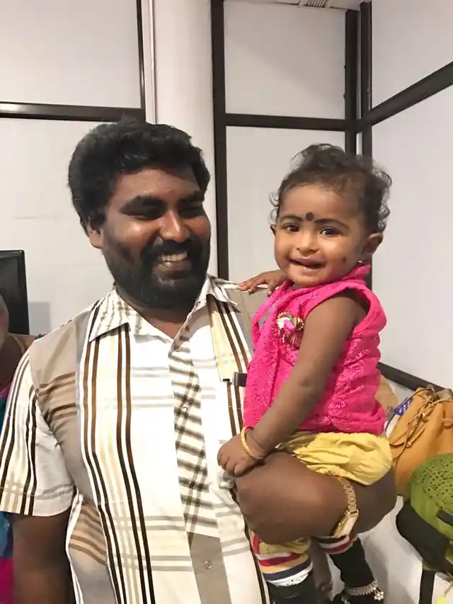 Darshini, the mischievous little girl pictured above, is a year old. She was operated for VSD at 11 months. Her father is a clerk in a school, in Madhurai. (Photo: <b>The Quint</b>)