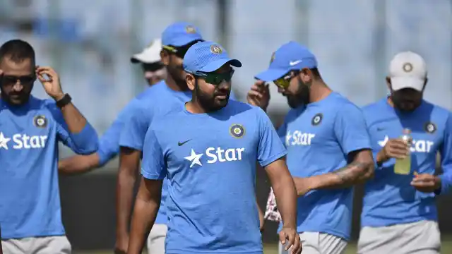 Rohit Sharma (centre) along with Ajinkya Rahane can certainly be a calming influence on the excitable Virat Kohli in Tests.