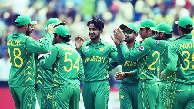 Pakistan’s Hasan Ali, centre, celebrates a wicket with his team-mates during the ICC Champions Trophy. 