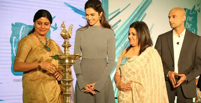 Deepika Padukone and Anna Chandy light the lamp with other members of The Live Love Laugh Foundation.
