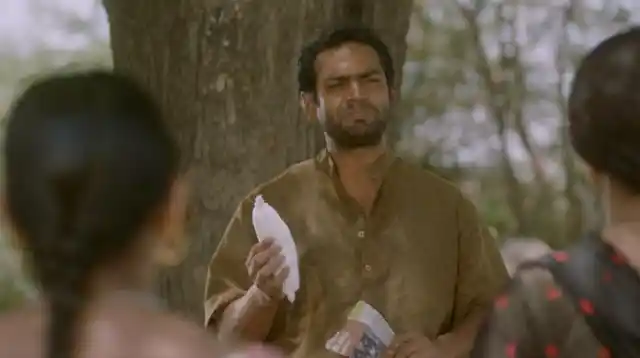 Sharib Ali Hashmi introduces the handmade pad to the women of his village, in a scene from <i>Phullu. </i>