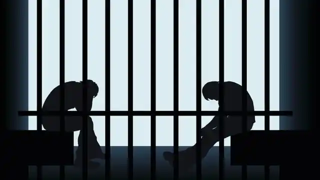 Representational image of jail and inmates.