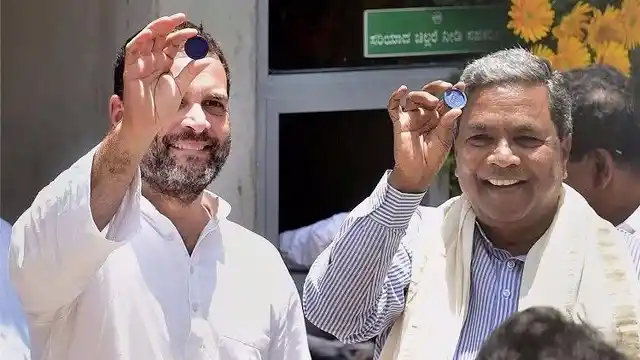 Rahul Gandhi and Siddaramaiah at the inauguration of ‘Indira Canteen’ in Bengaluru on Wednesday.