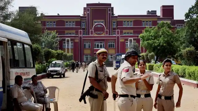 File photo of police stand guard at Ryan International School during a protest, in Gurugram on 9 September.