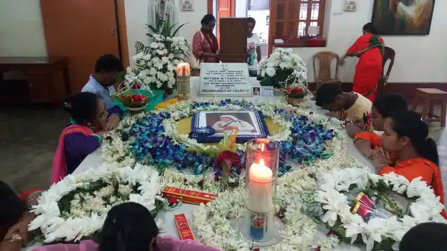 People paying floral tribute to Mother Teresa at Portuguese Church in central Kolkata, 6 September 2017.