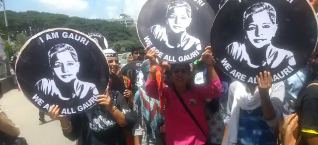Citizens holding posters at #IAmGauri rally.