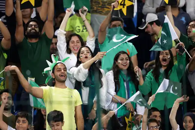 Pakistani cricket fans watch the match between World XI and Pakistan at Gaddafi stadium in Lahore, Pakistan, Tuesday, 12 September 2017.